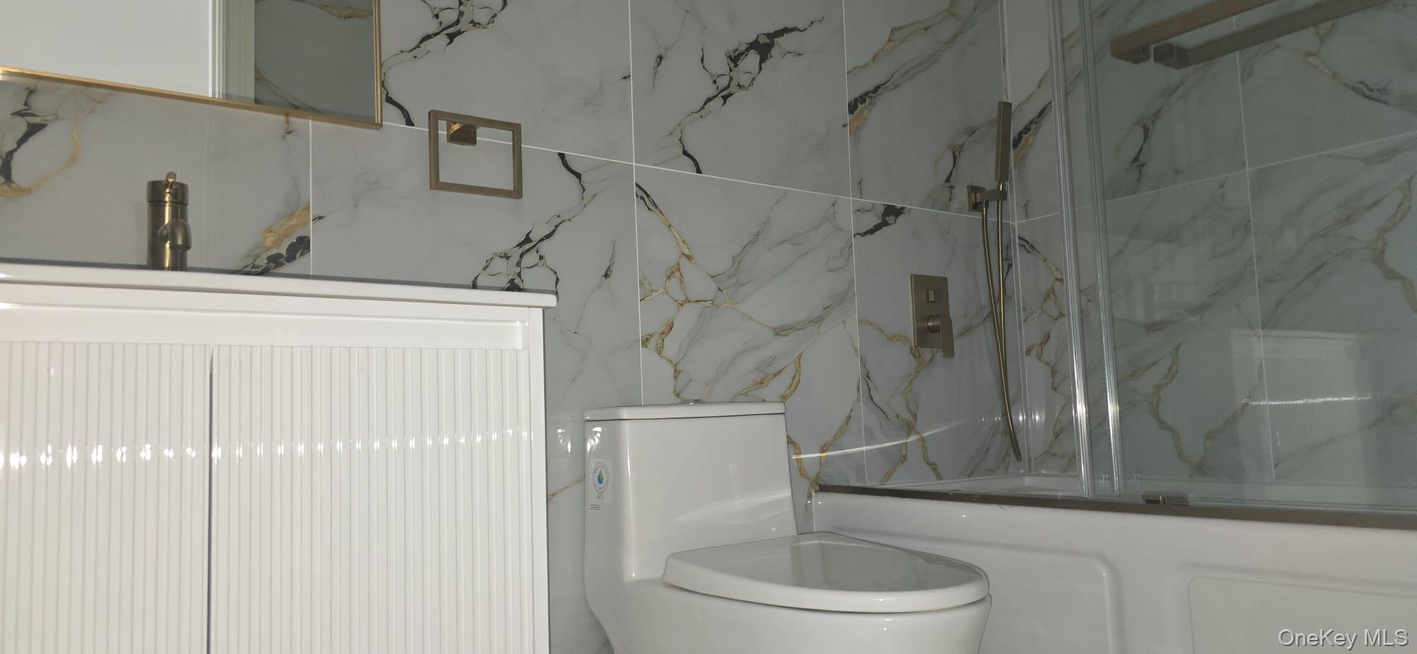 108-33 164th Street Queens, NY 11433 - Photo 16 of 20 a bathroom with a toilet and a shower