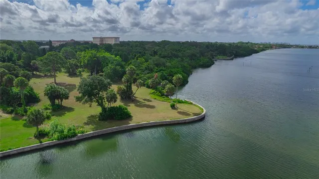 a view of a lake with a yard