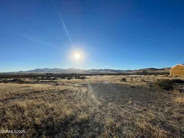 a view of an ocean and mountain