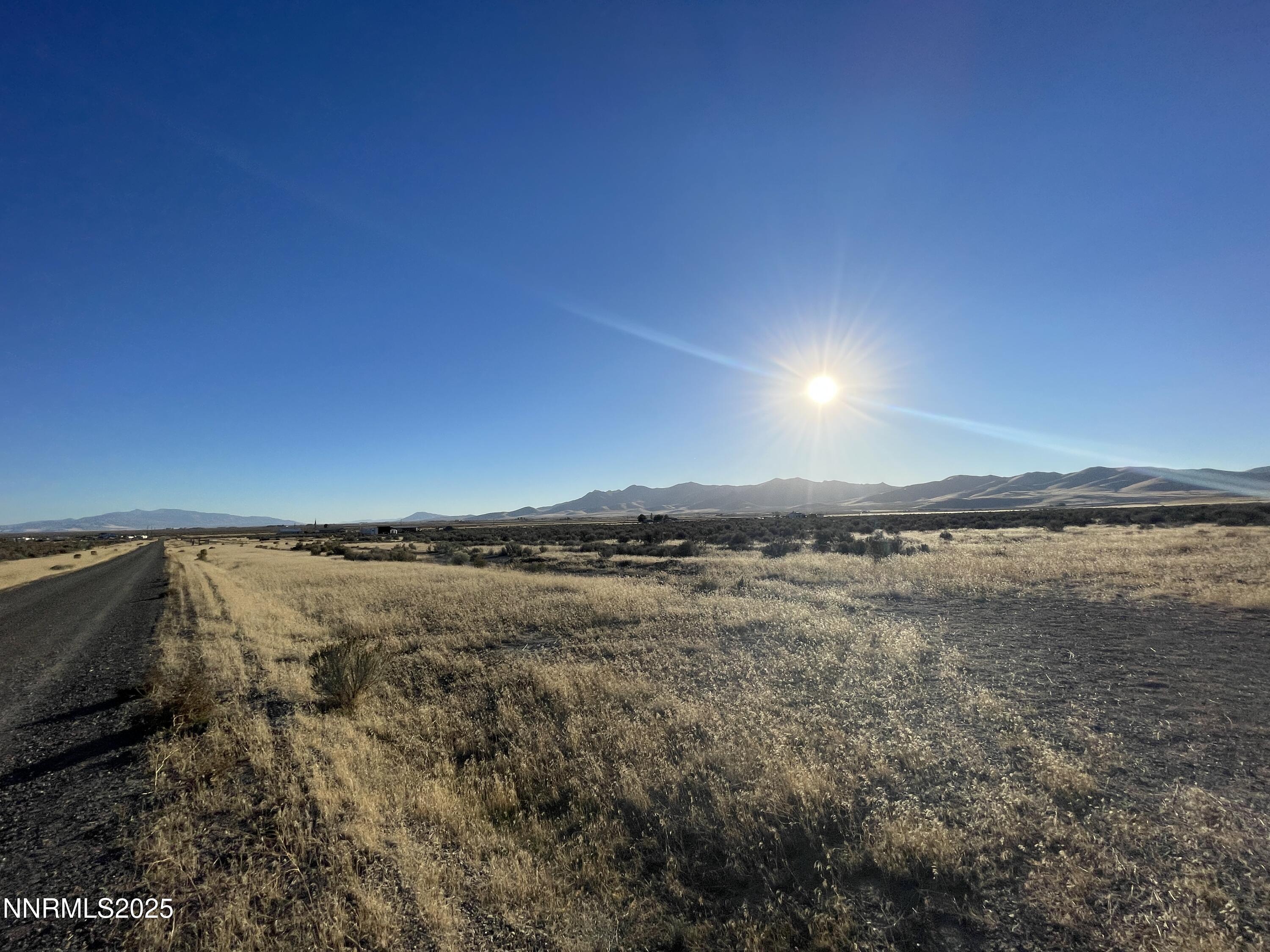 6004211 Springfield Road Winnemucca, NV 89445 - Photo 7 of 13 a view of an ocean and mountain