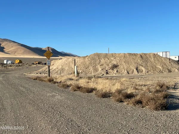 a view of an ocean with a mountain