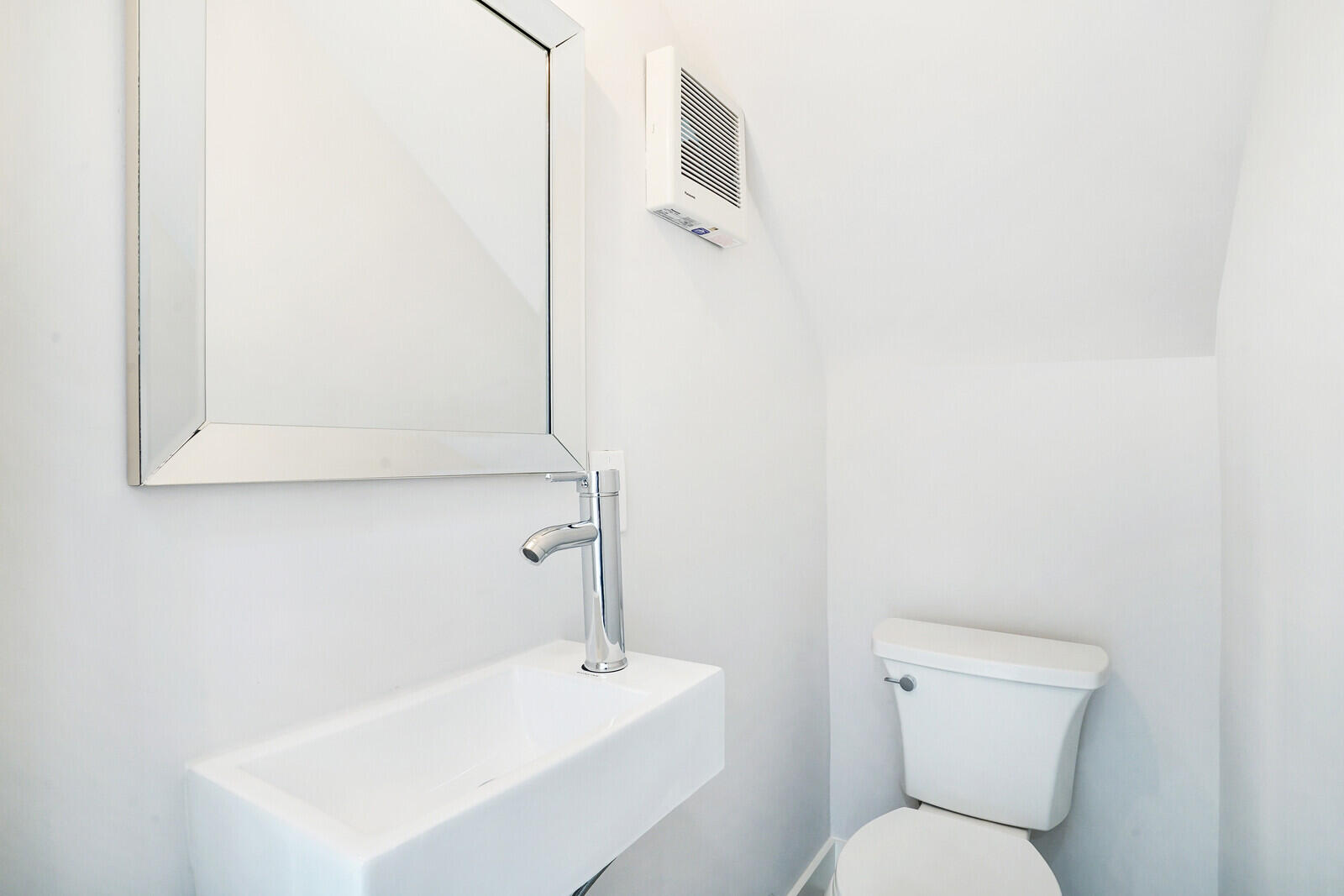 29 E Road Delray Beach, FL 33483 - Photo 16 of 34 a bathroom with a sink a toilet and shower