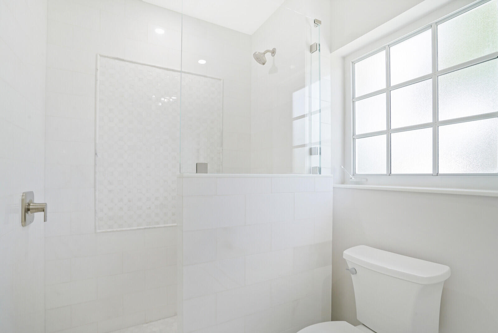 29 E Road Delray Beach, FL 33483 - Photo 22 of 34 a bathroom with a toilet and a shower