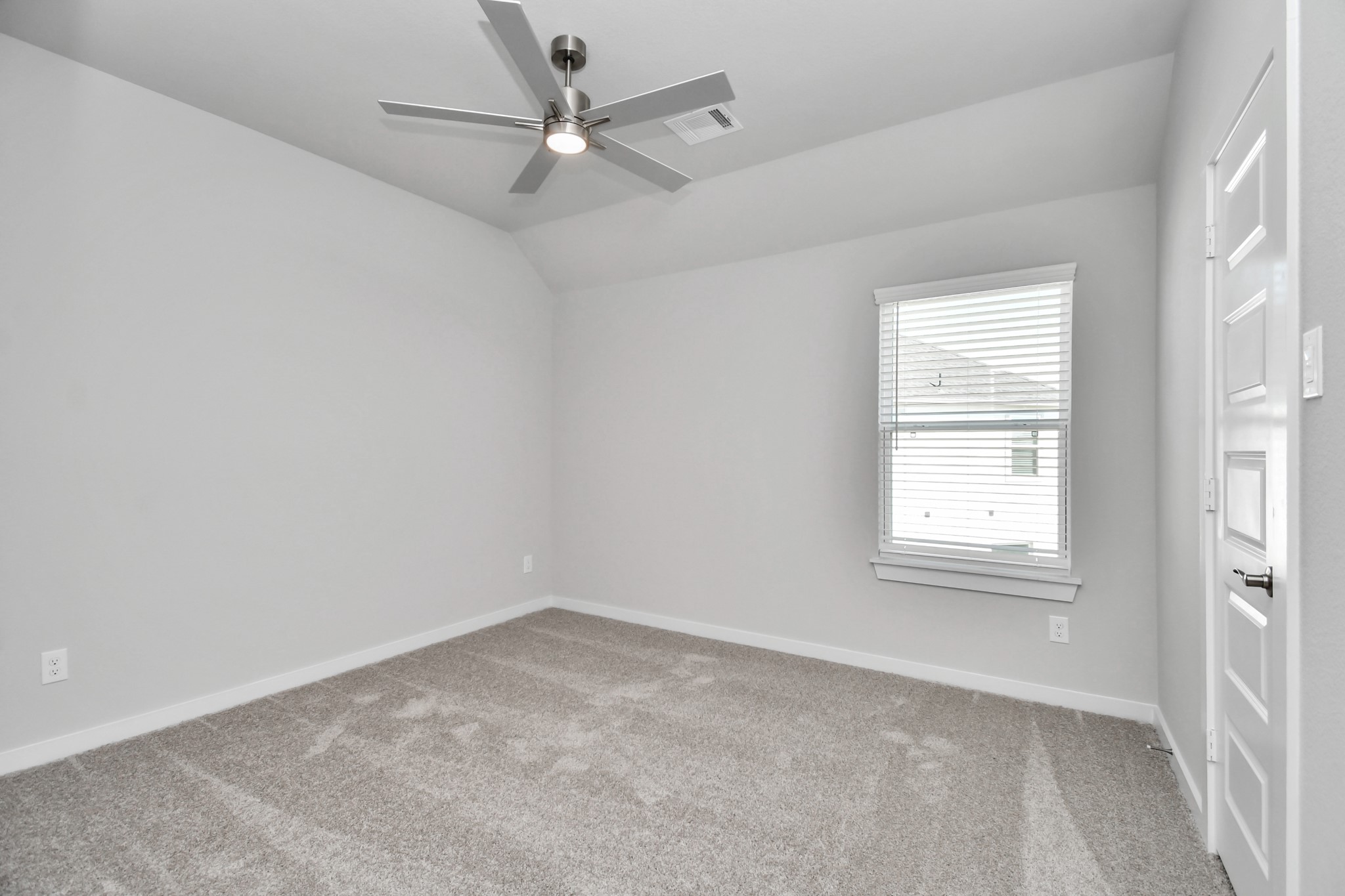 3103 Native Spg Drive Spring, TX 77373 - Photo 28 of 36 an empty room with a window and a fan