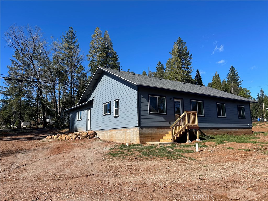14014 Creston Road Magalia, CA 95954 - Photo 9 of 30 a view of a house with a yard