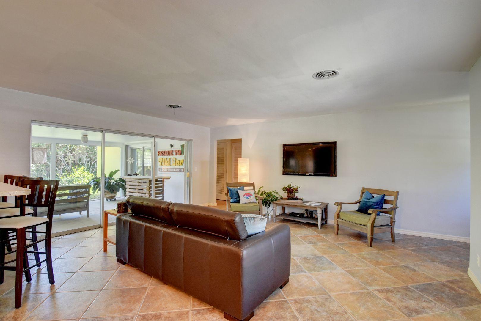 698 Southwest 4th Street Boca Raton, FL 33486 - Photo 34 of 52 Sliders from most rooms to great porch!