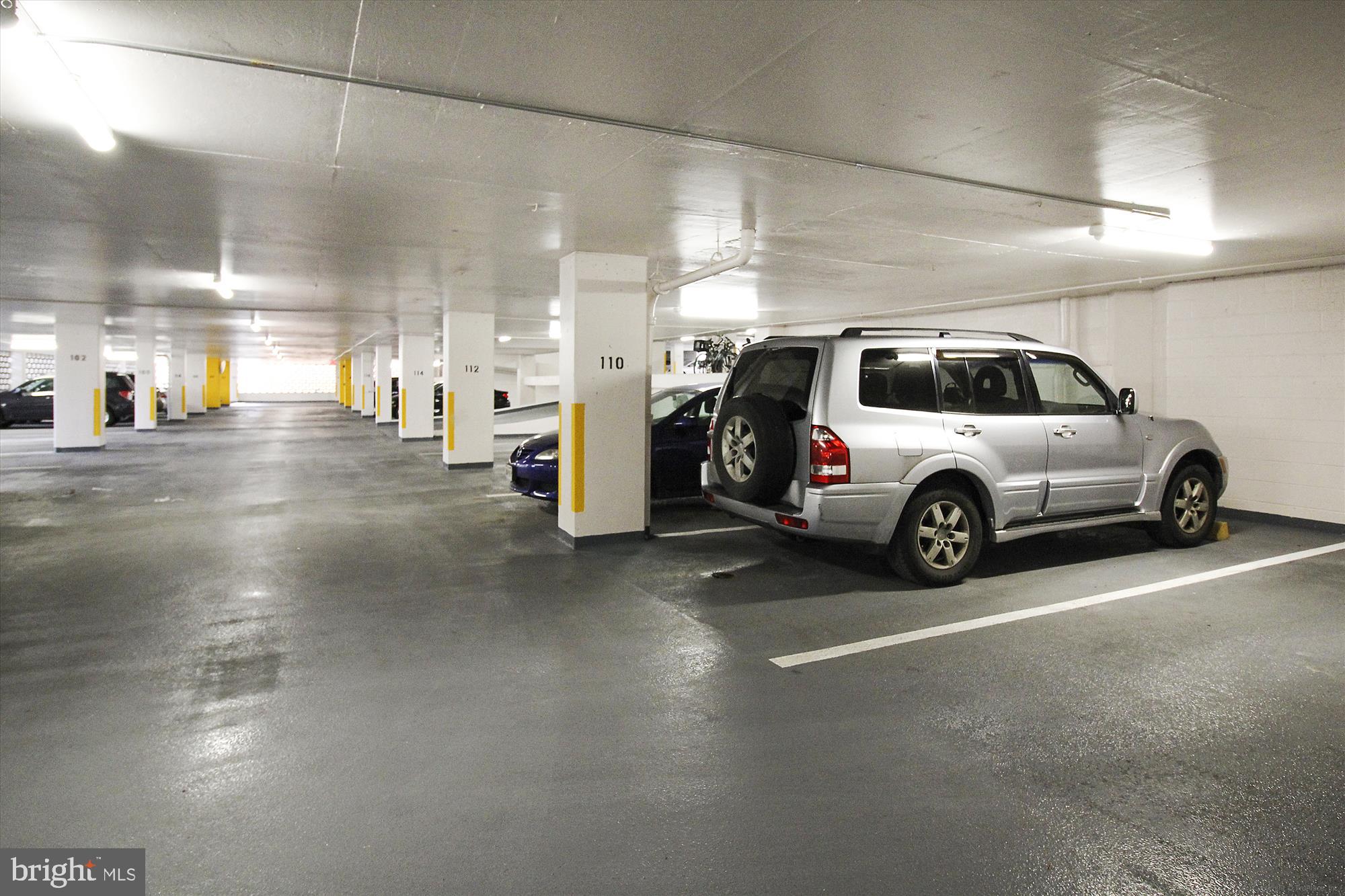 4242 East-West Highway, Unit 414 Chevy Chase, MD 20815 - Photo 30 of 66 a view of a car parking