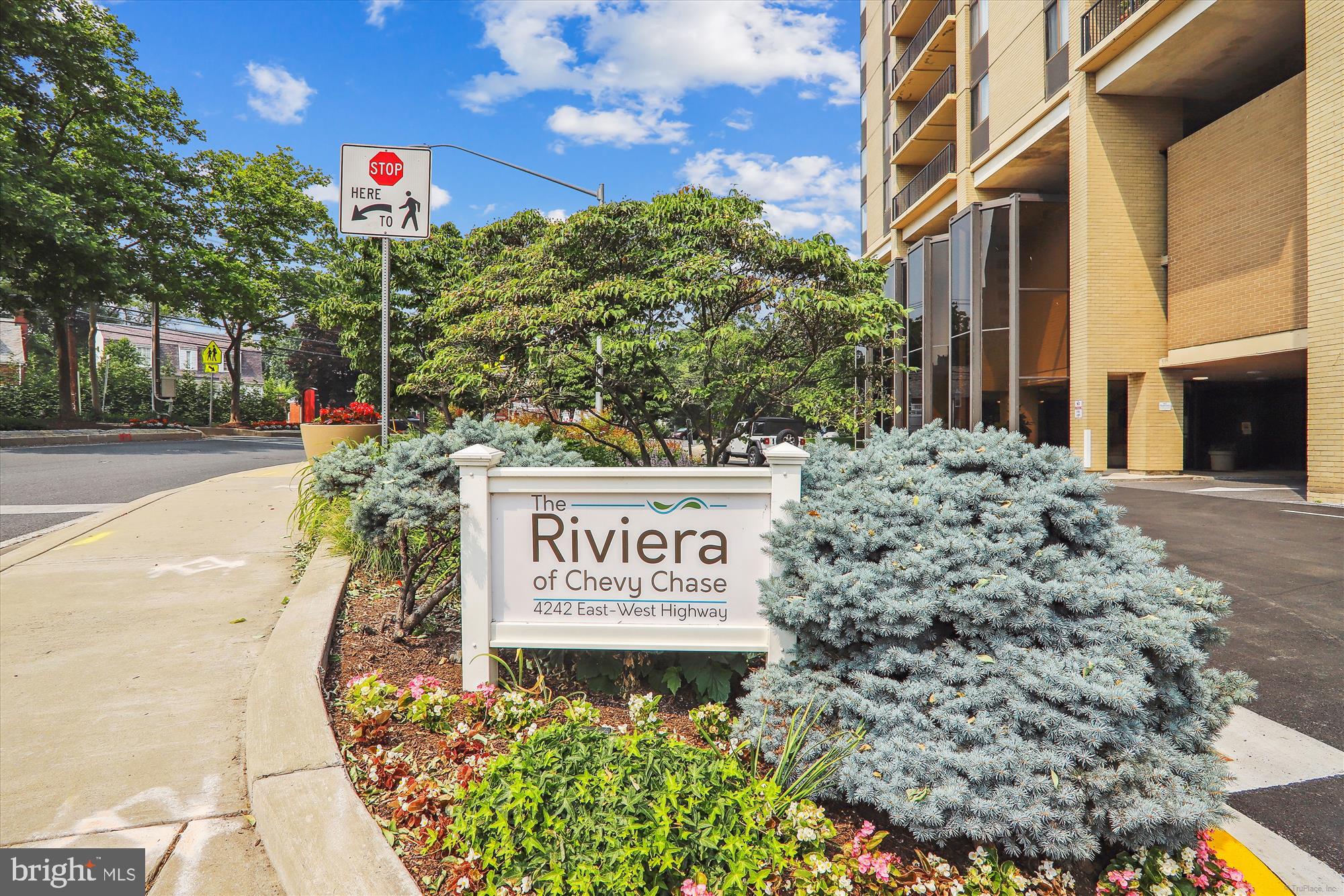 4242 East-West Highway, Unit 414 Chevy Chase, MD 20815 - Photo 32 of 66 a sign that is on the side of a building