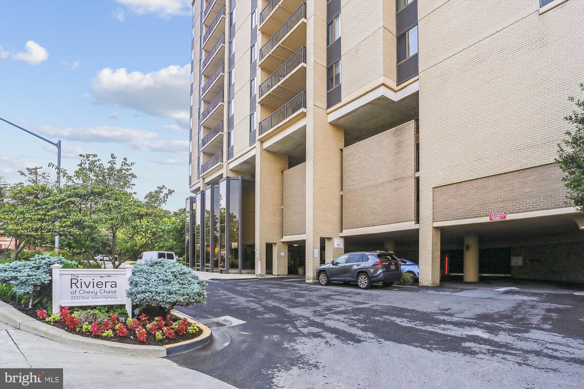 4242 East-West Highway, Unit 414 Chevy Chase, MD 20815 - Photo 36 of 66 a view of a street with cars