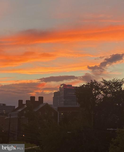 4242 East-West Highway, Unit 414 Chevy Chase, MD 20815 - Photo 4 of 66 Sunset views over Bethesda Cityline from unit.