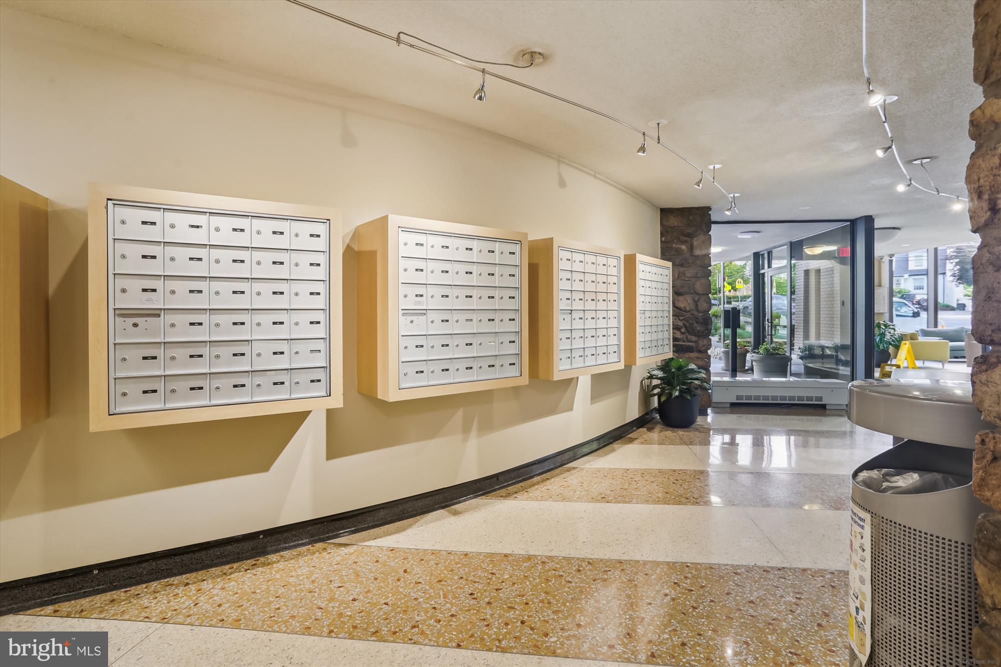 4242 East-West Highway, Unit 414 Chevy Chase, MD 20815 - Photo 40 of 66 a view of a living room and dining room