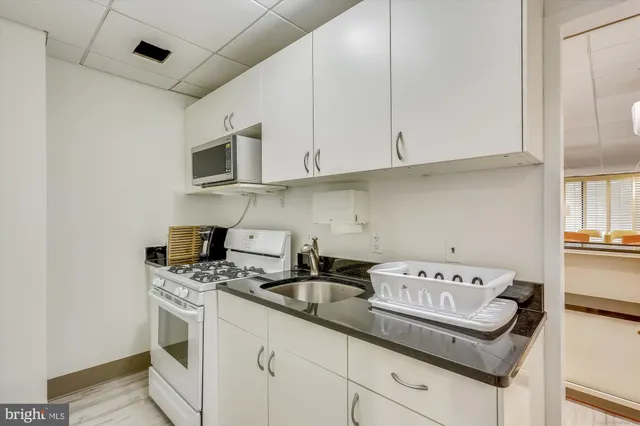 a view of a building with backyard