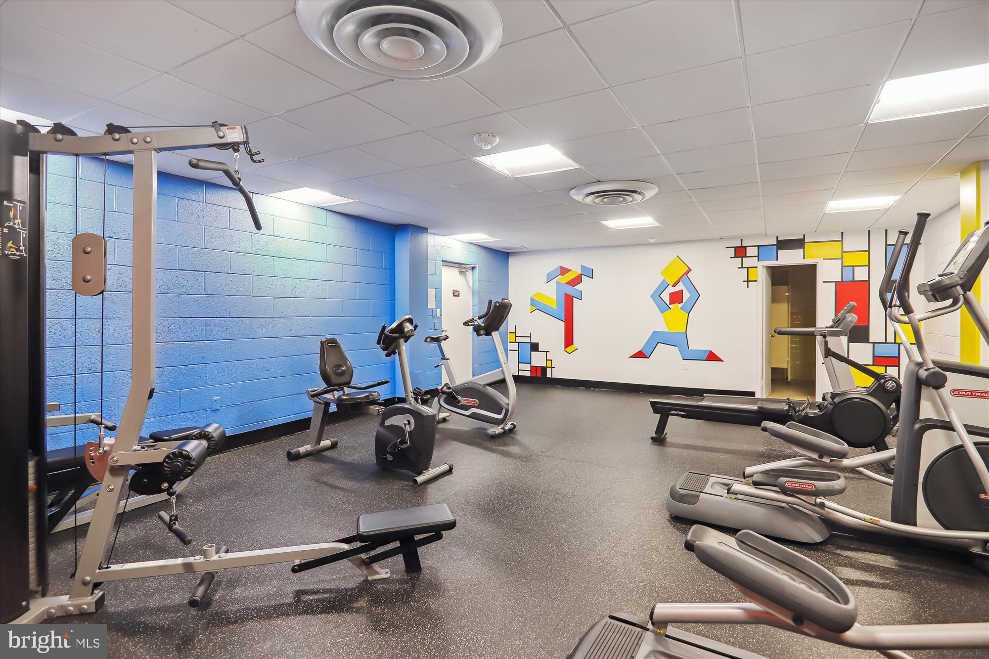 4242 East-West Highway, Unit 414 Chevy Chase, MD 20815 - Photo 47 of 66 a view of a room with gym equipment