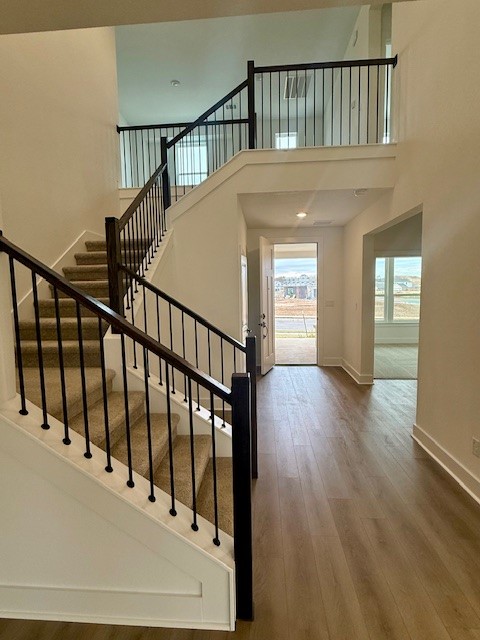 121 Prodigal Way Kyle, TX 78640 - Photo 6 of 12 a view of staircase with railing and a window