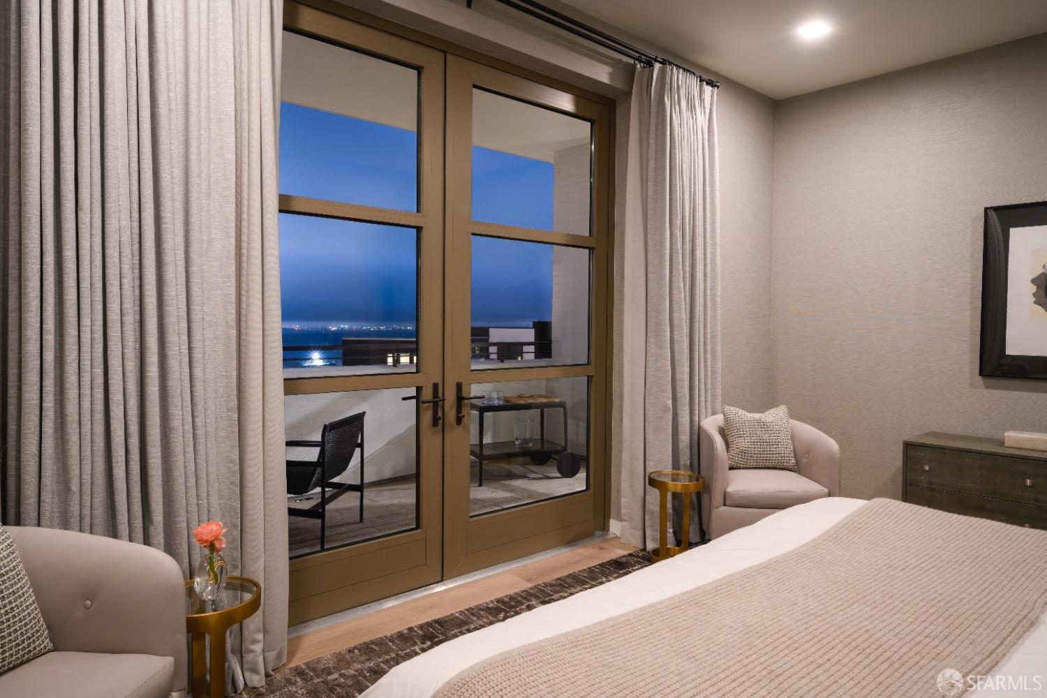 36 Meadow Drive, Unit 202 San Francisco, CA 94130 - Photo 13 of 50 a bedroom with a bed and a couch