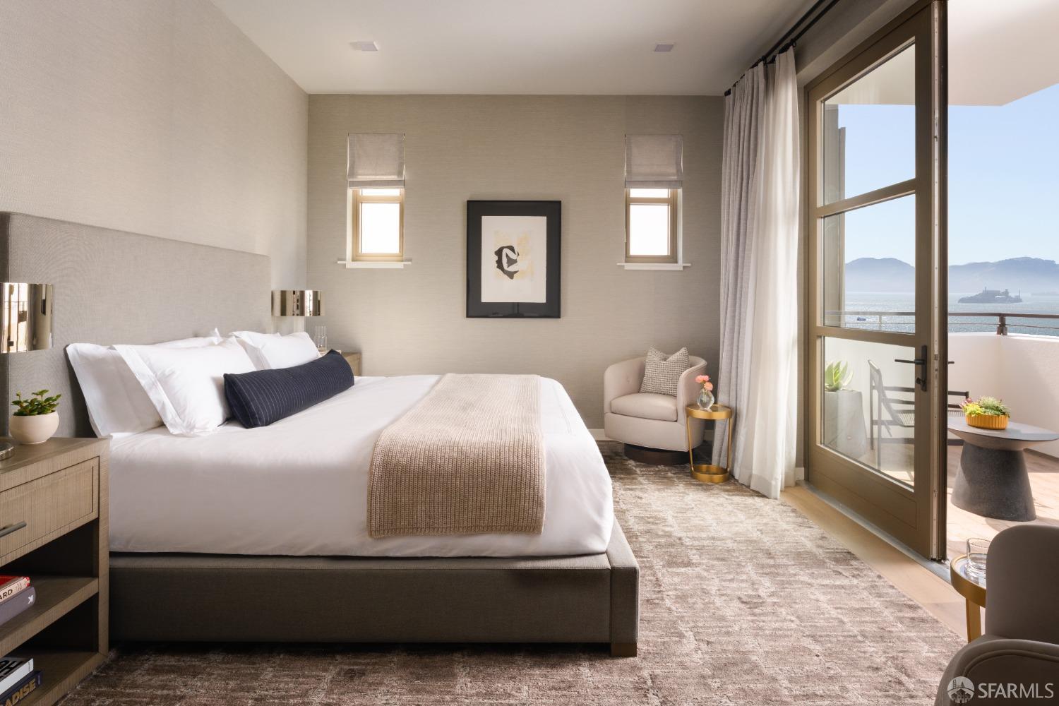 36 Meadow Drive, Unit 202 San Francisco, CA 94130 - Photo 16 of 50 a bedroom with a bed and a large window