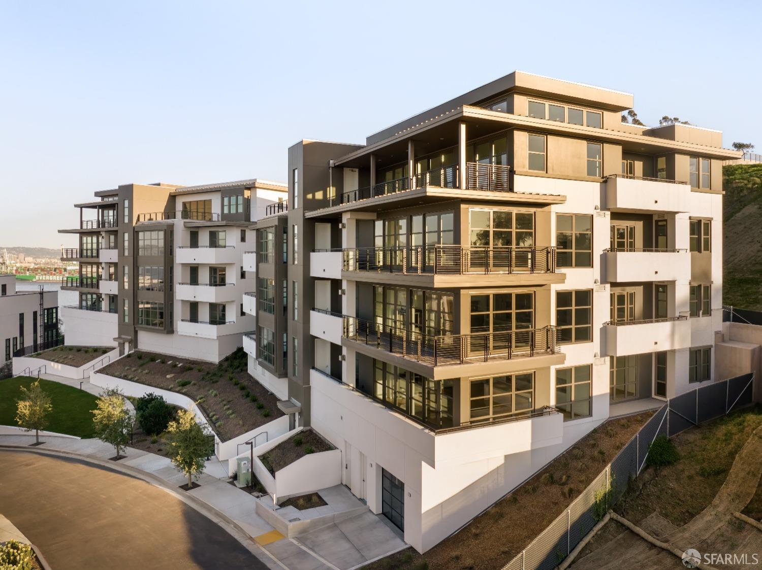 36 Meadow Drive, Unit 202 San Francisco, CA 94130 - Photo 20 of 50 a view of a large building with a lot of windows