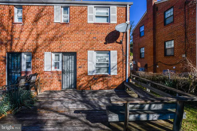 a brick building with a large window