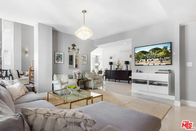 a view of living room with furniture and window