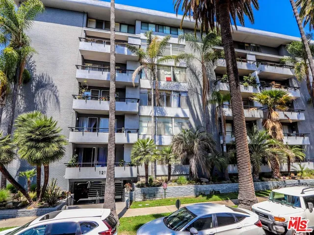 a bedroom with a bed and furniture