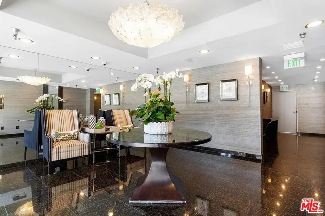 a view of a patio with swimming pool table and chairs