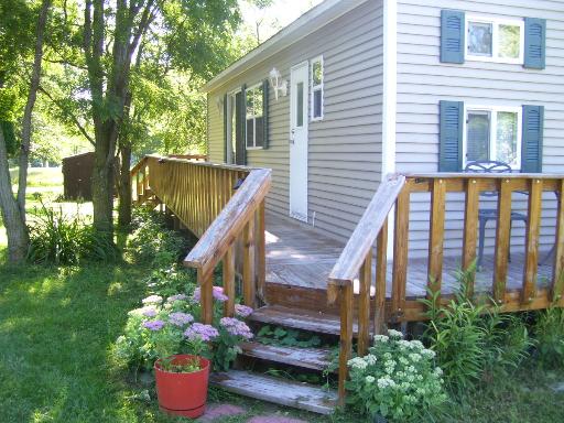 509 La Moille Road, Unit 2408 Sublette, IL 61367 - Photo 1 of 14 a backyard of a house with lots of green space
