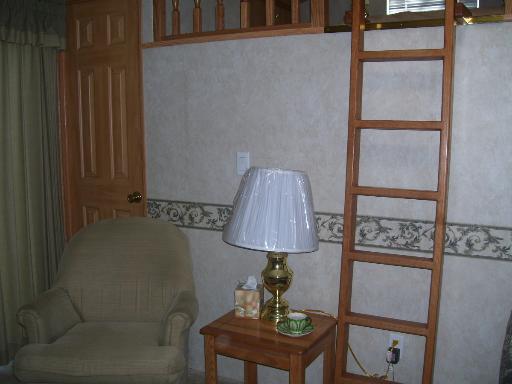 509 La Moille Road, Unit 2408 Sublette, IL 61367 - Photo 7 of 14 a room with a table and a potted plant
