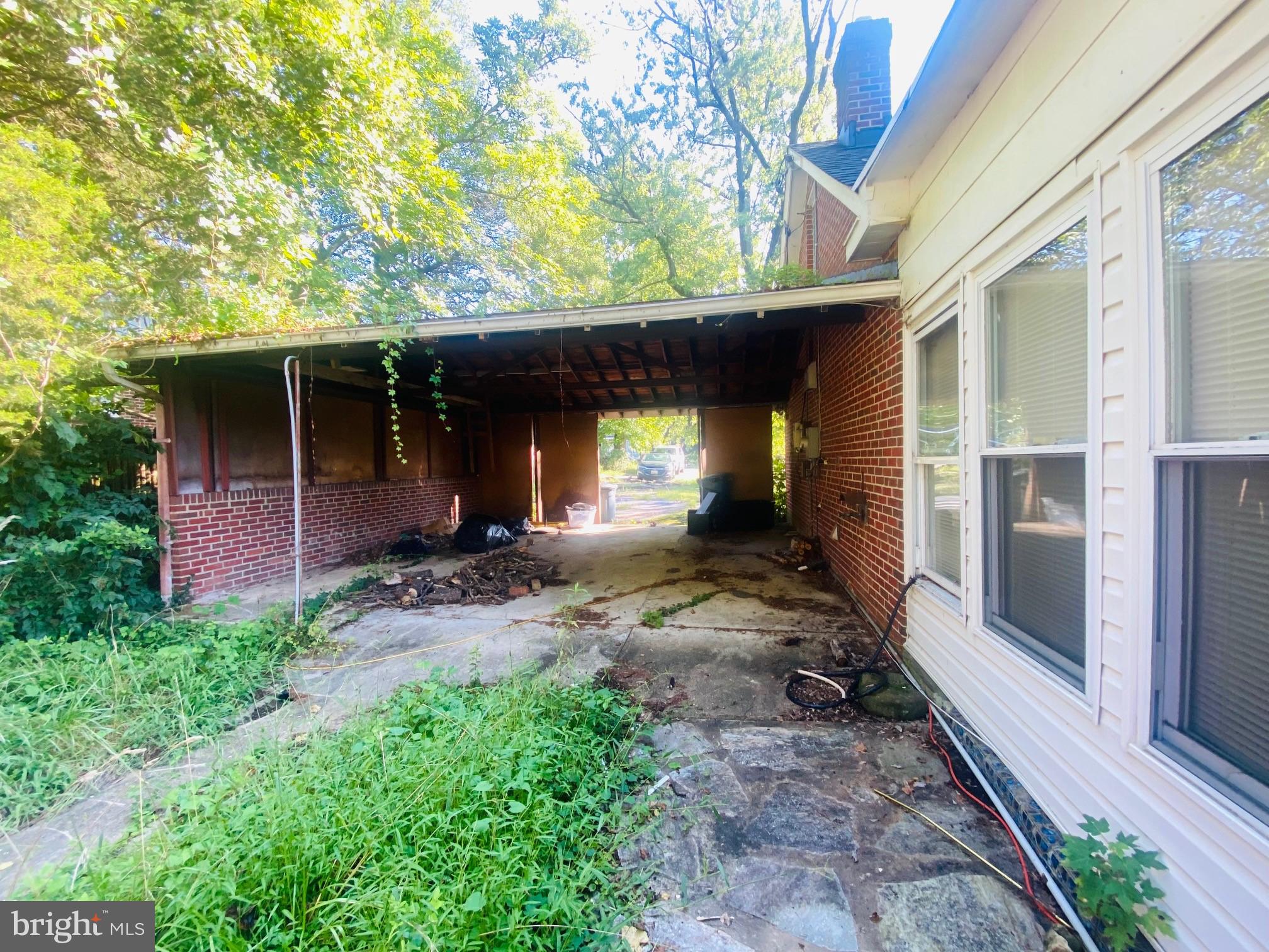 6715 Campfield Road Baltimore, MD 21207 - Photo 2 of 3 Rear view of carport