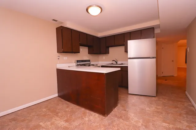 a kitchen with a sink and a cabinets