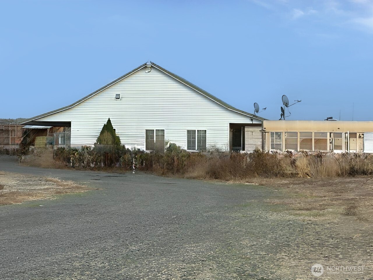 9973 Se Road South Warden, WA 98857 - Photo 3 of 8 a view of a yard in front of a house