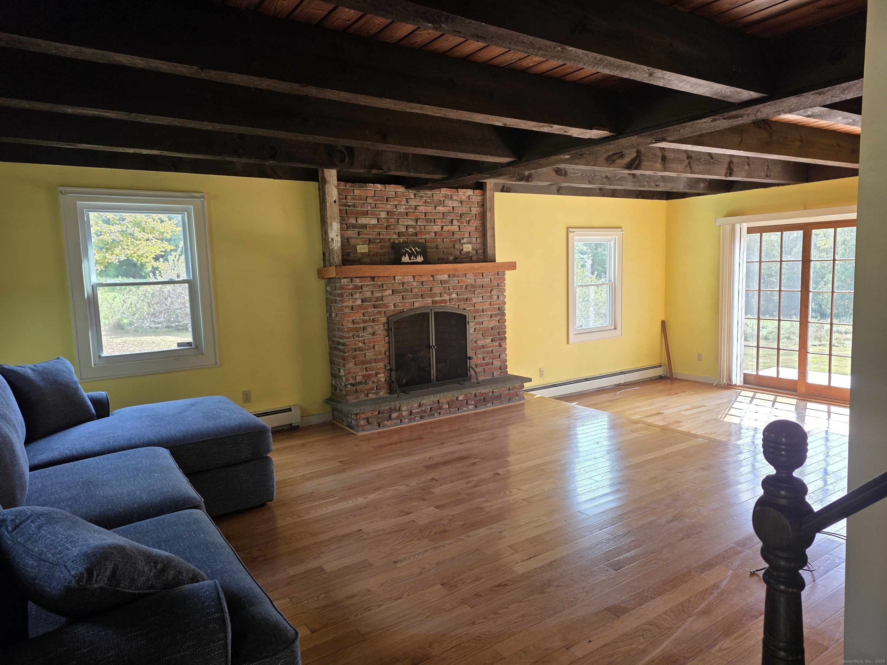 70 Colebrook Road Norfolk, CT 06058 - Photo 7 of 23 a view of livingroom with furniture wooden floor and windows