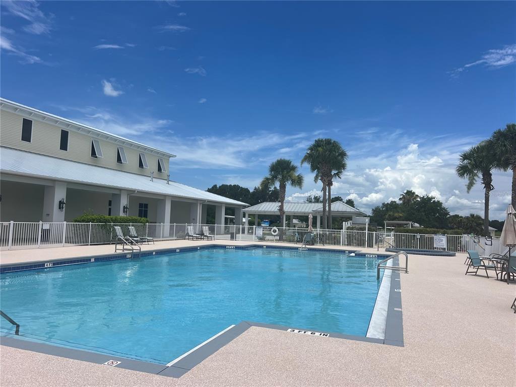 4813 Southeast 92nd Boulevard Webster, FL 33597 - Photo 17 of 21 a view of a house with pool
