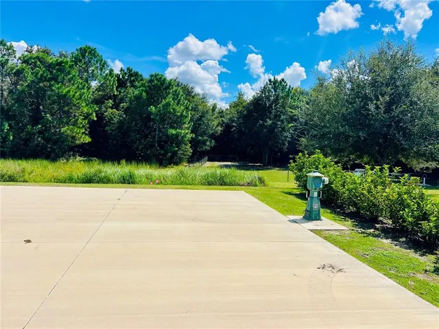 a view of a backyard of a house