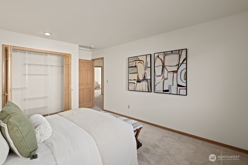 14610 Southeast 184th Place Renton, WA 98058 - Photo 21 of 31 a bedroom with a bed and a window