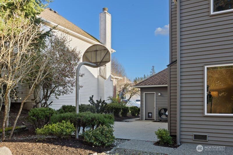 14610 Southeast 184th Place Renton, WA 98058 - Photo 29 of 31 a front view of a house with garden