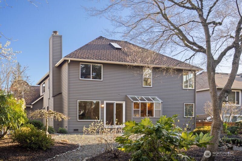 14610 Southeast 184th Place Renton, WA 98058 - Photo 30 of 31 a front view of a house with a yard