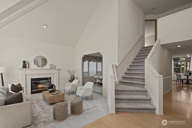 14610 Southeast 184th Place Renton, WA 98058 - Photo 3 of 31 a living room with furniture and a fireplace