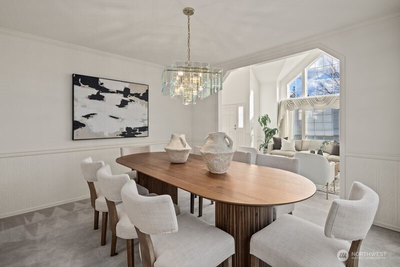 14610 Southeast 184th Place Renton, WA 98058 - Photo 4 of 31 a view of a dining room with furniture and chandelier