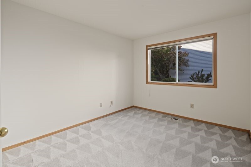 14610 Southeast 184th Place Renton, WA 98058 - Photo 10 of 31 an empty room with a window