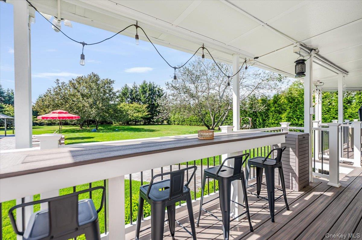 525 Rocky Point Road East Marion, NY 11939 - Photo 30 of 48 a view of a chairs and table in patio