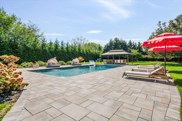 swimming pool view with a outdoor space