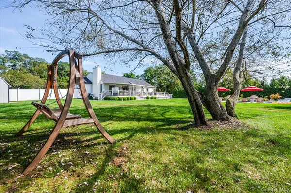 a view of a house with a big yard