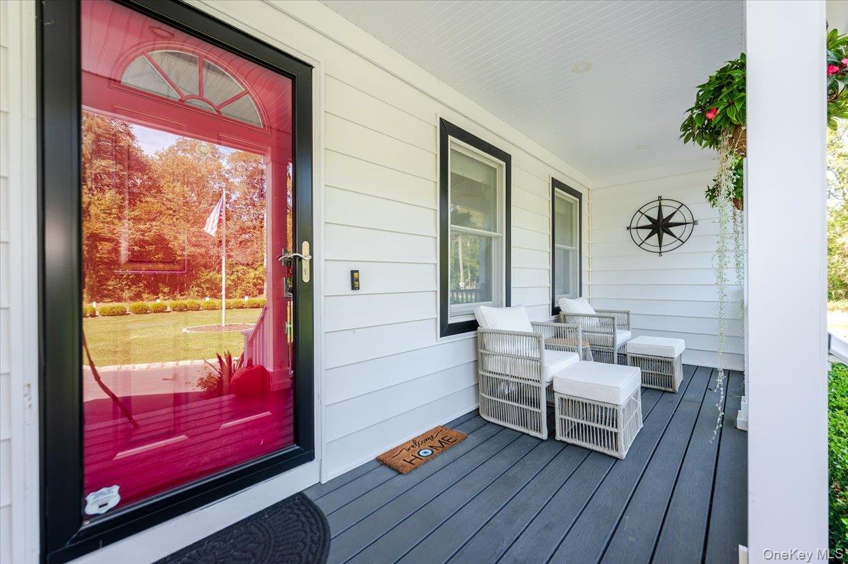 525 Rocky Point Road East Marion, NY 11939 - Photo 9 of 48 a living room with furniture and next to a window