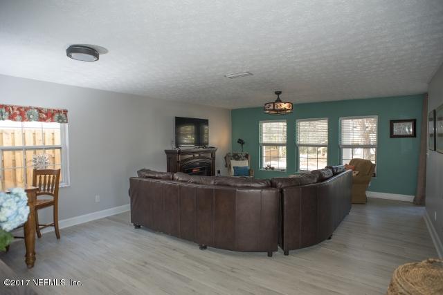 275 Jellison Road St. Augustine, FL 32080 - Photo 4 of 37 a living room with furniture and a window