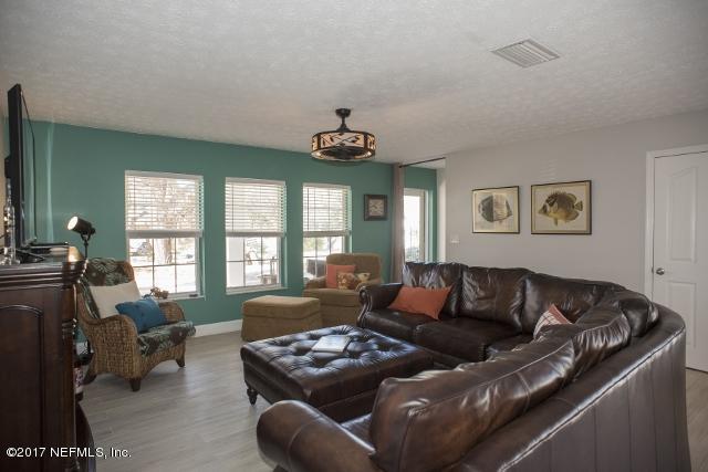 275 Jellison Road St. Augustine, FL 32080 - Photo 5 of 37 a living room with furniture and a large window