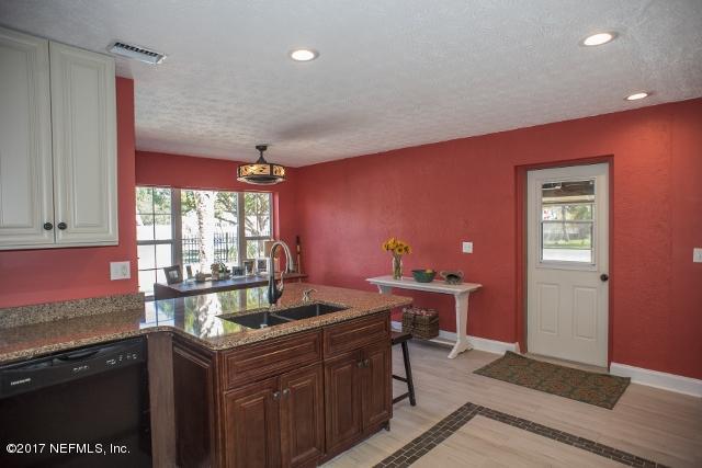 275 Jellison Road St. Augustine, FL 32080 - Photo 8 of 37 a kitchen with a sink cabinets and window