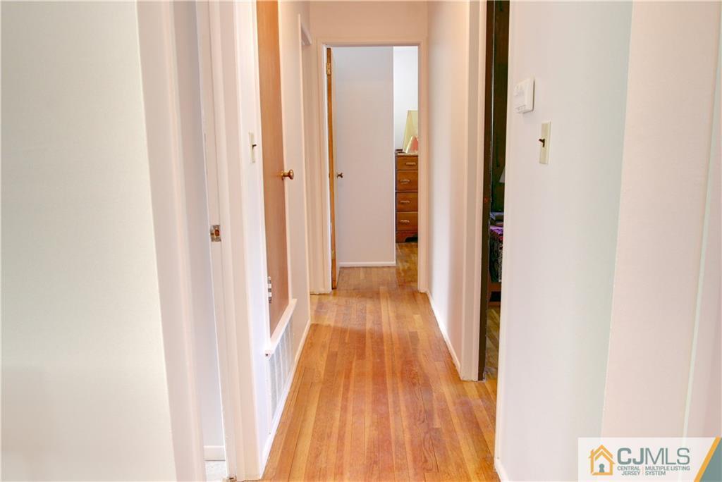 5 Purdue Road Old Bridge, NJ 08859 - Photo 10 of 25 a view of a hallway with wooden floor