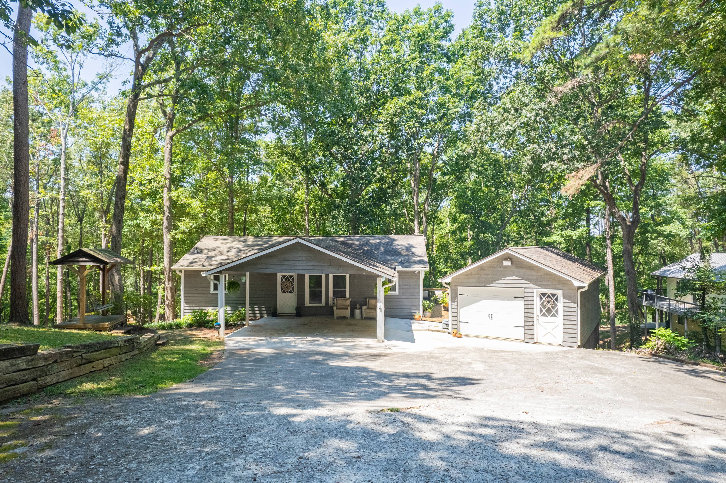 396 Cardinal Lane Toccoa, GA 30577 - Photo 12 of 103 a front view of a house with a yard