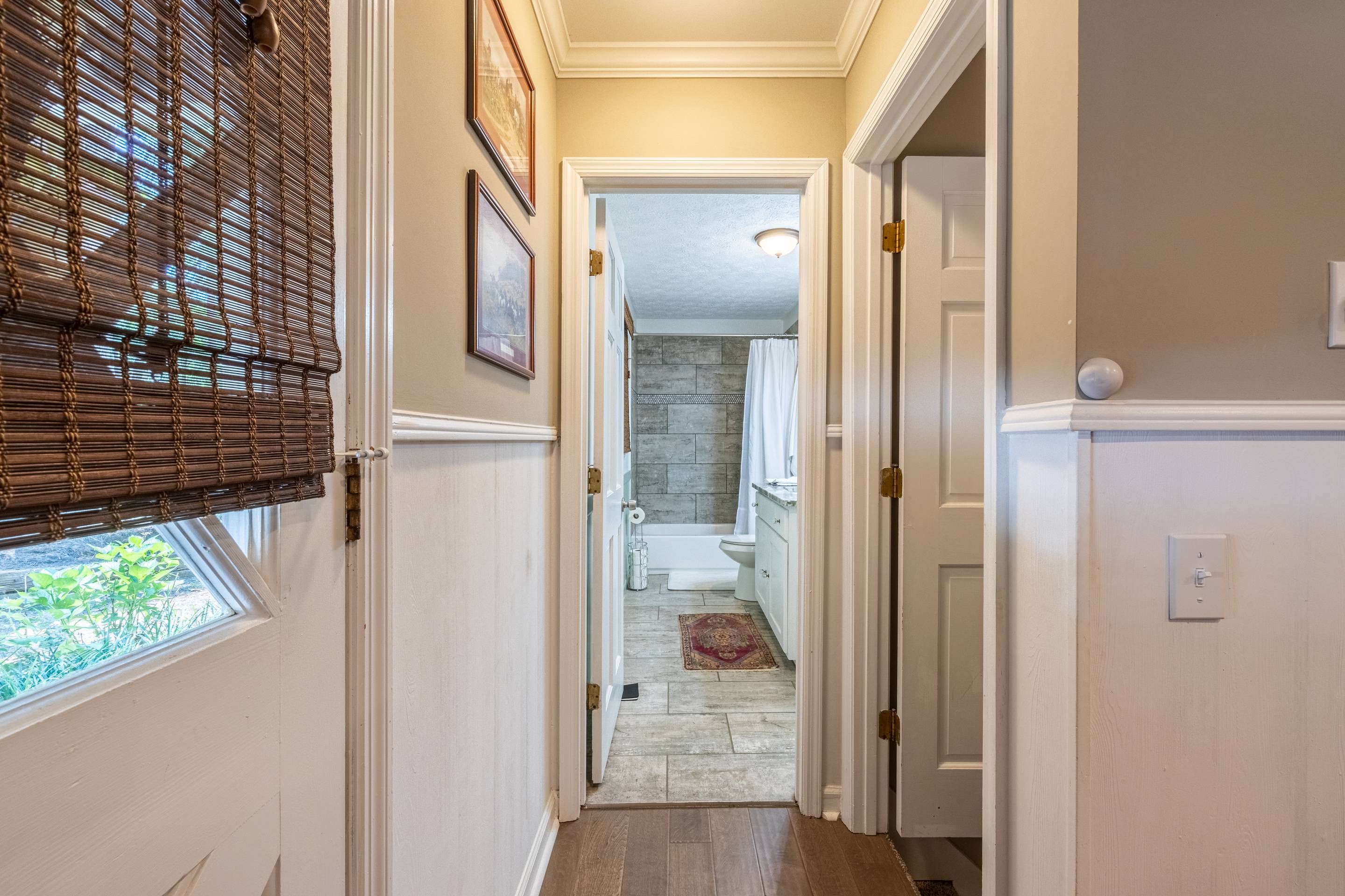 396 Cardinal Lane Toccoa, GA 30577 - Photo 17 of 103 a view of a bathroom with a glass door