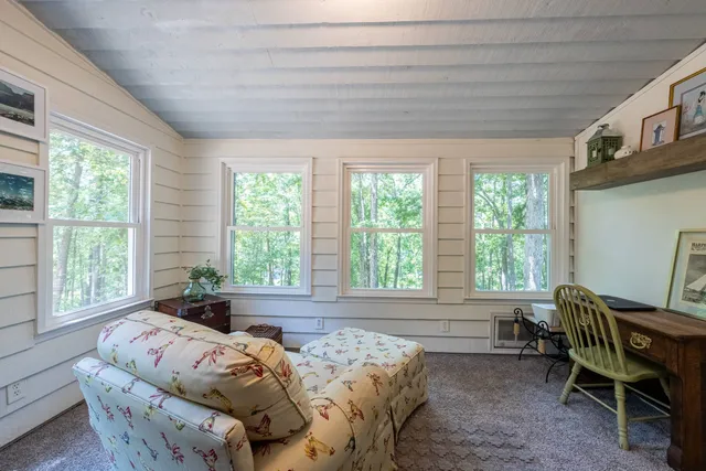 a kitchen with stainless steel appliances granite countertop a stove a microwave and a refrigerator